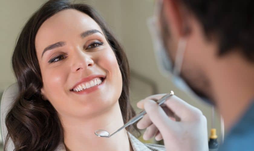 Orthodontist doing treatment of a patient