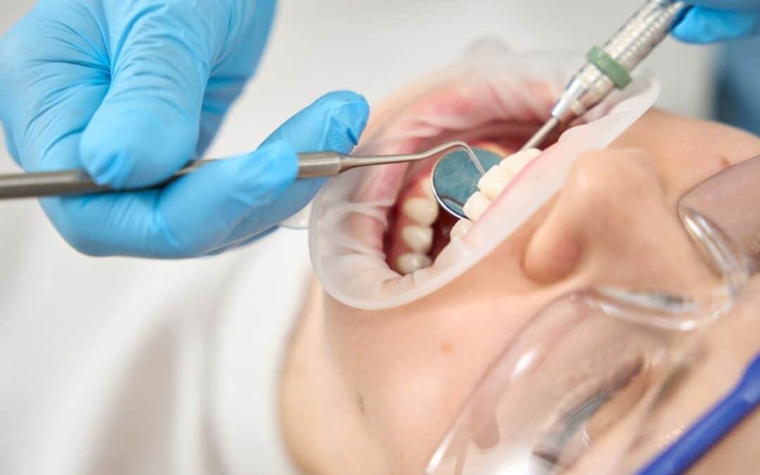 Person Having teeth checked at orthodontic team
