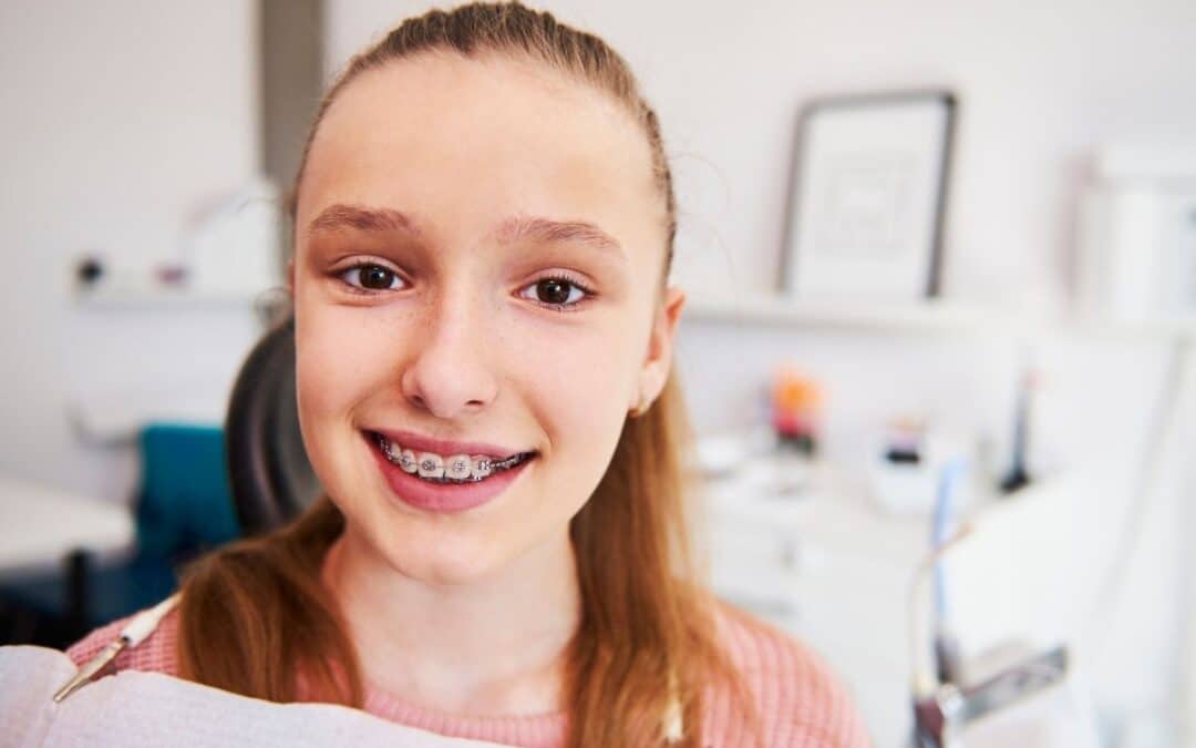 teen girl having braces treatment